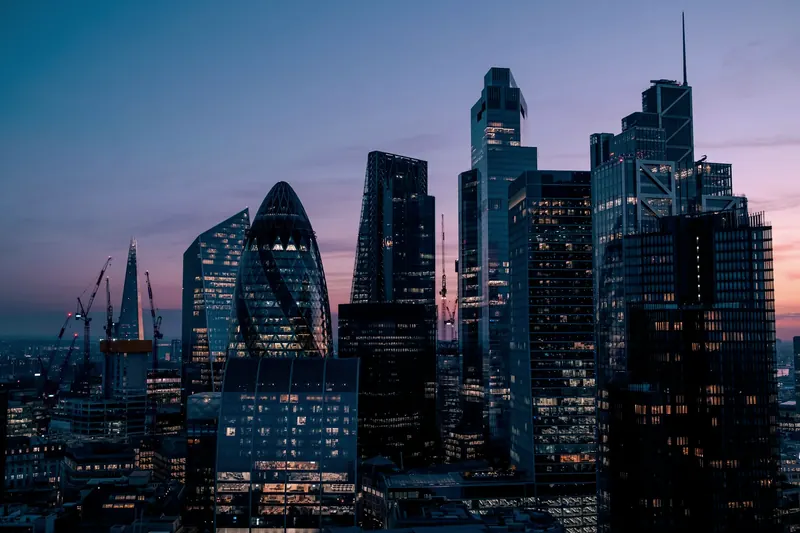 Tall buildings on the London skyline at dusk
